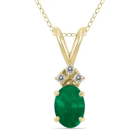 14K Yellow Gold 6X4Mm Oval Emerald And Three Stone Diamond Pendant