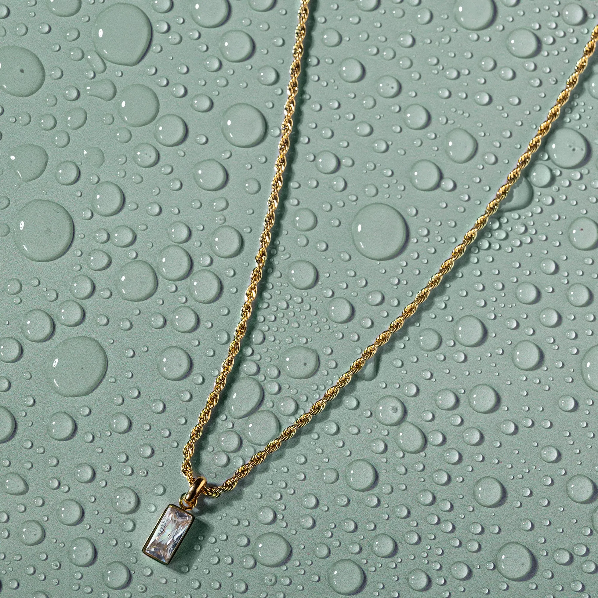 Accessorize London Women's Water Proof Gold Stainless Steel Twisted Chain Emerald Cut Pendant Necklace