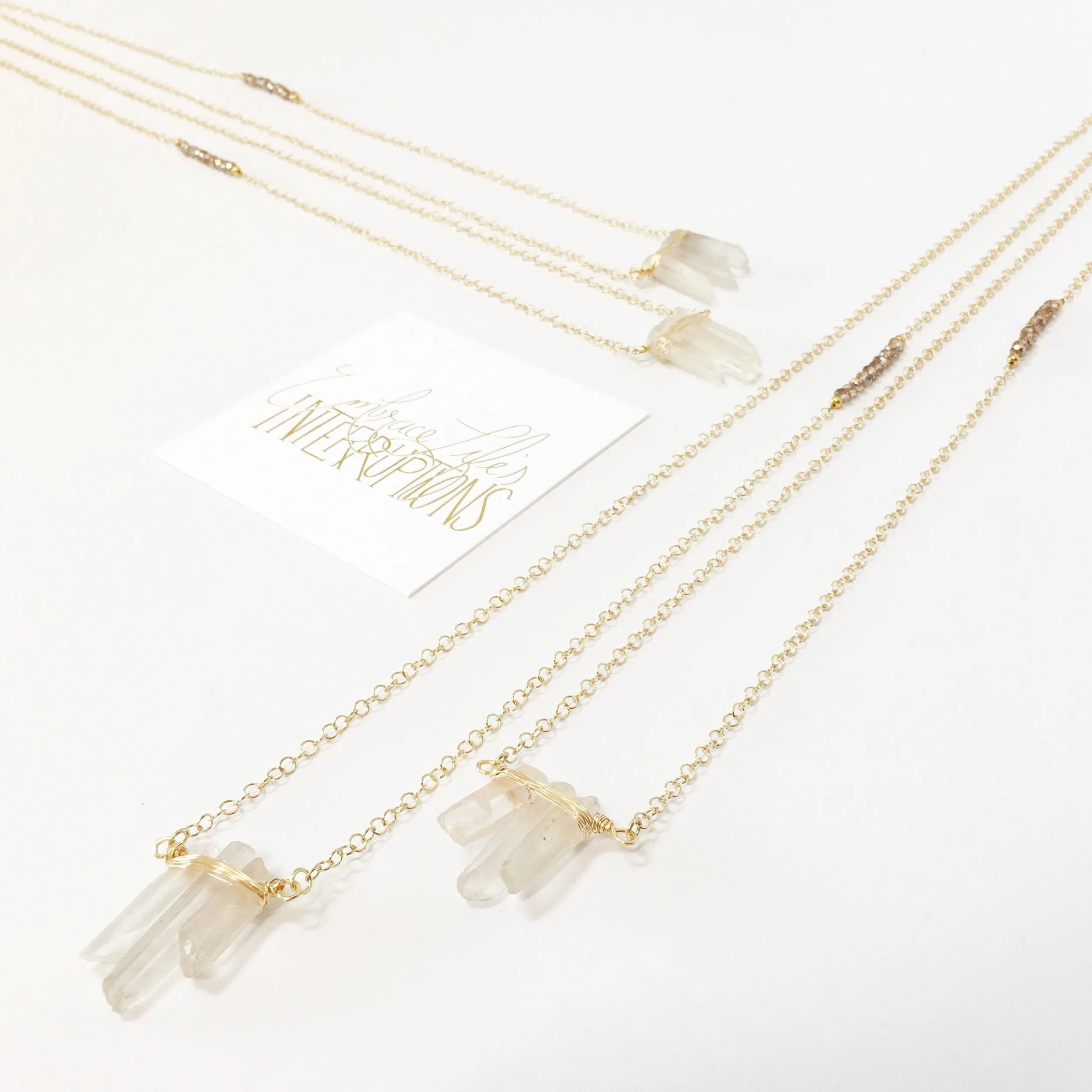 Embrace Life's Interruptions: Clear quartz wire wrapped gemstone pendant necklace (thirty inches)