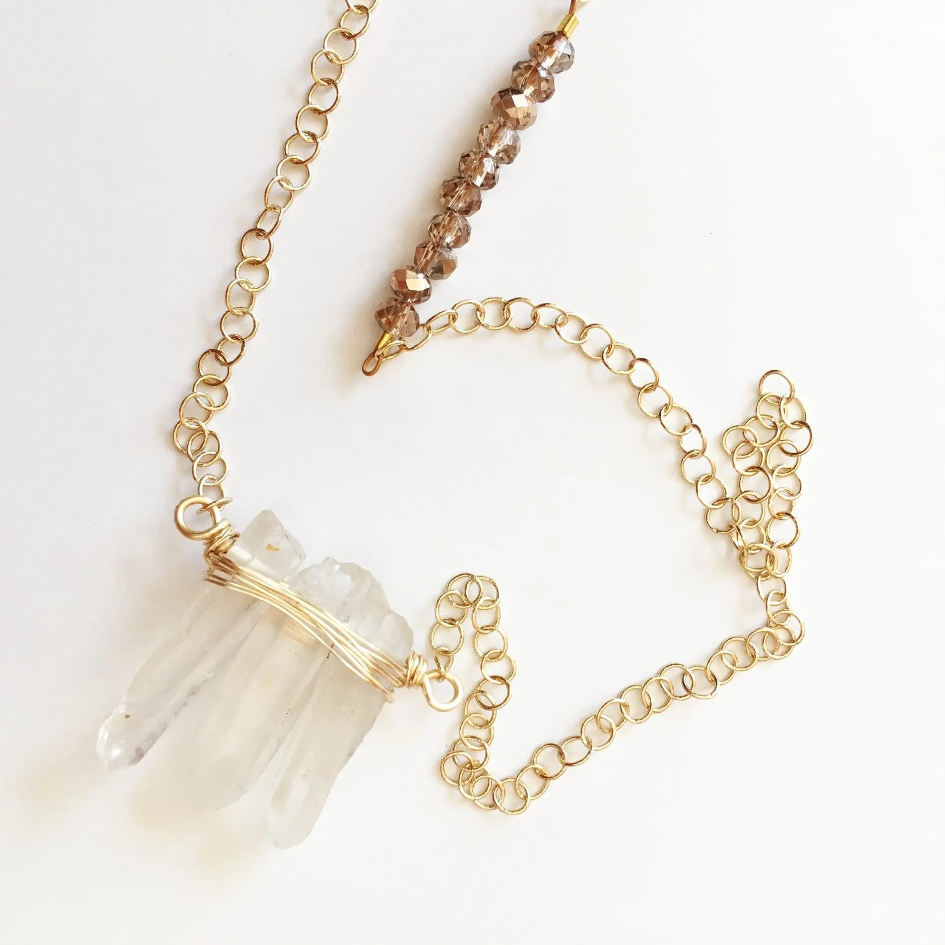 Embrace Life's Interruptions: Clear quartz wire wrapped gemstone pendant necklace (thirty inches)