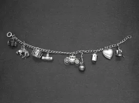 Estate 9pc Sterling Silver Charm Bracelet 22.6 Grams