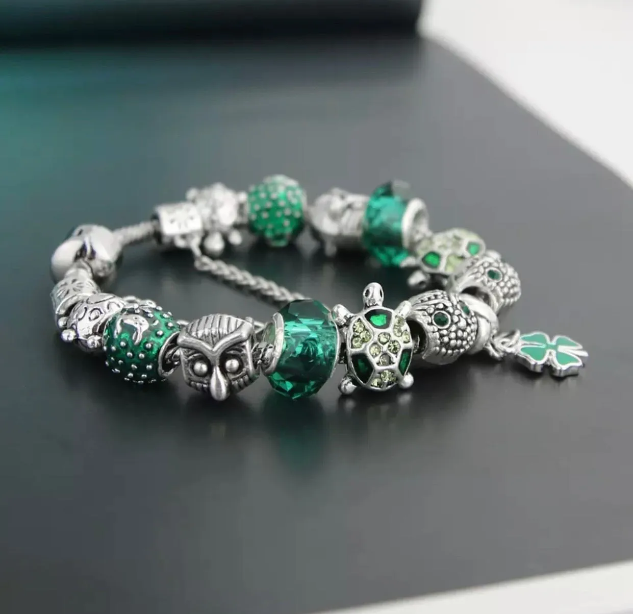 Four leaf clover, turtle, and owl bracelet
