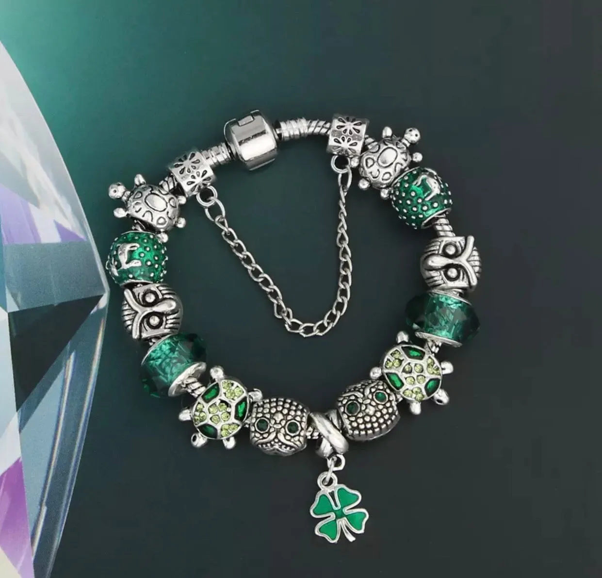 Four leaf clover, turtle, and owl bracelet
