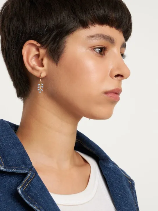 Isabel Marant   Casablanca mismatched earrings 