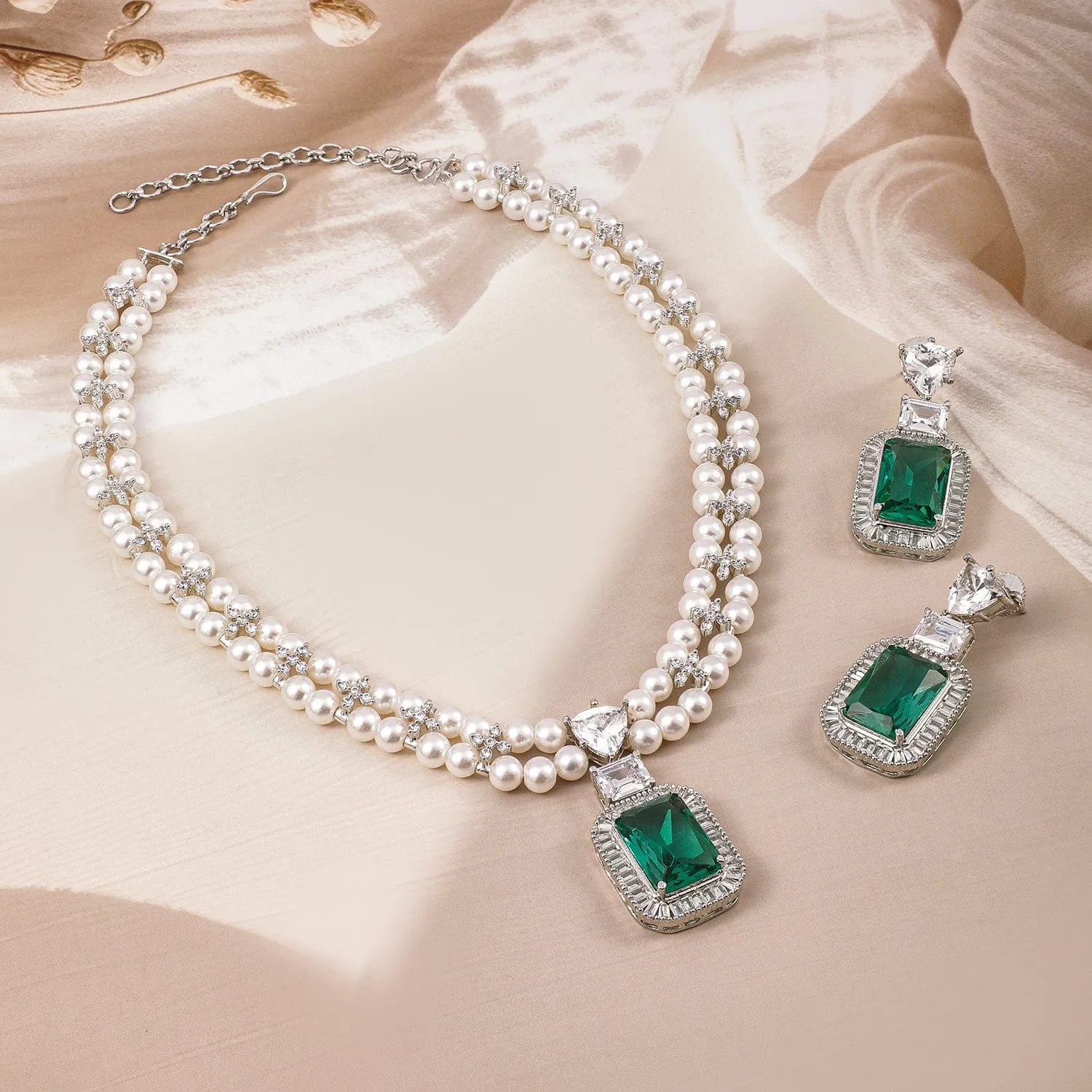 Rubans Rhodium Plated Pearl Necklace Set with Emerald & Cubic Zirconia Pendant & Earrings