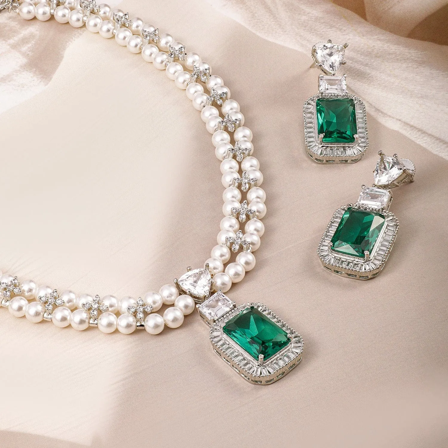 Rubans Rhodium Plated Pearl Necklace Set with Emerald & Cubic Zirconia Pendant & Earrings