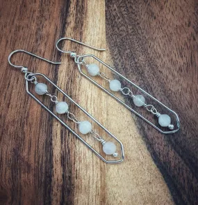 Sterling silver hammer textured oval hoops with moonstone